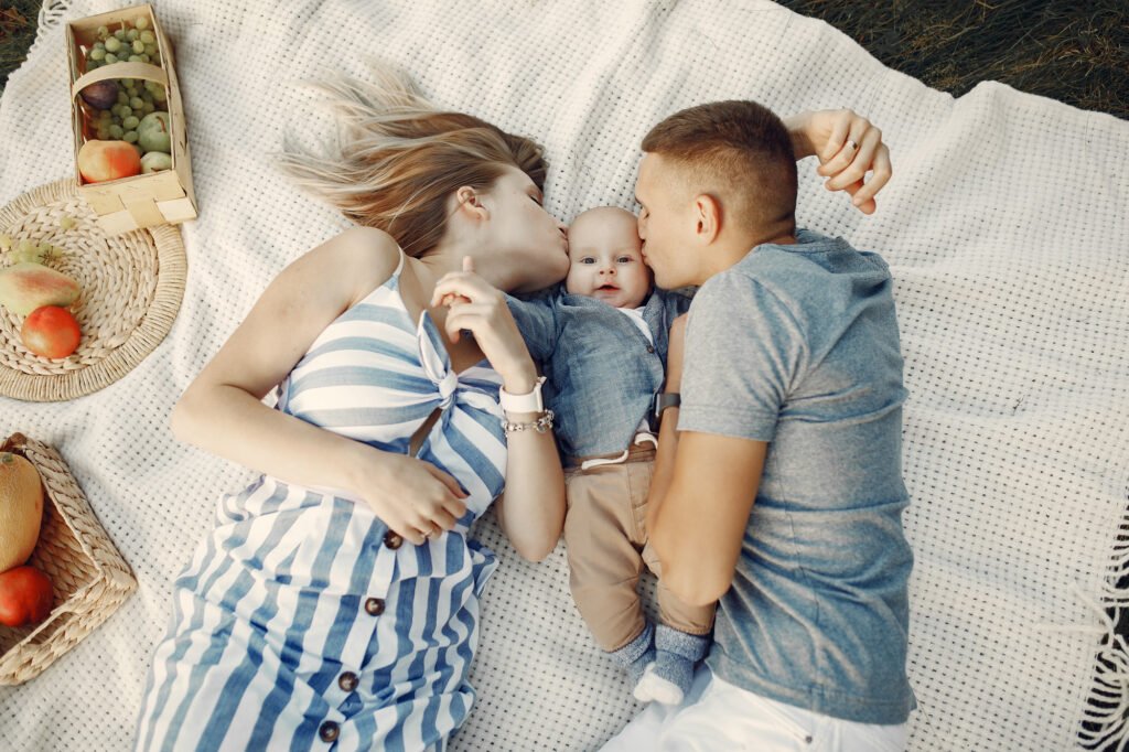 Family sleeping during a heatwave with children using safe sleep and cooling tips for hot summer nights and surviving the Heatwaves with Children