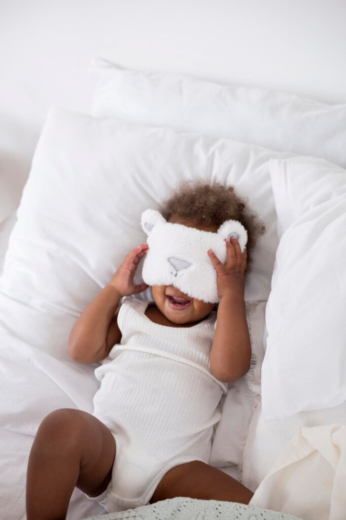 Baby lying awake in a cot during a sleep routine. Learn about healthy baby sleep, sleep regression, gentle sleep support, and evidence-based sleep advice for parents.
