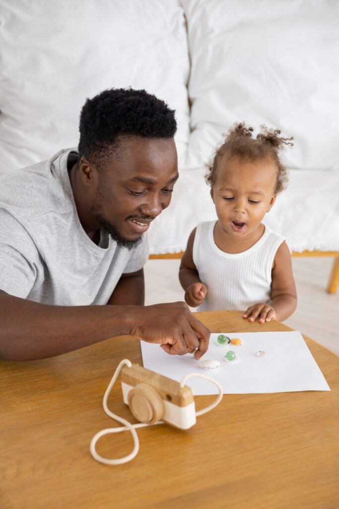 Parent and toddler playing together during the day to support healthy sleep, emotional connection, and bedtime routines.