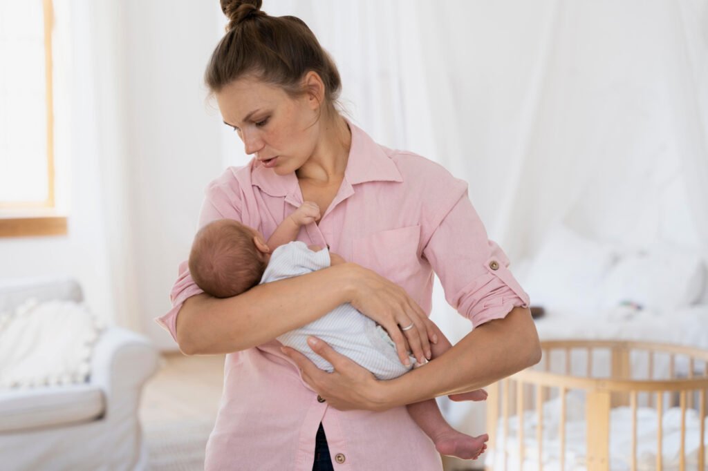 Mum holding and comforting her baby before sleep-child only falls asleep with me