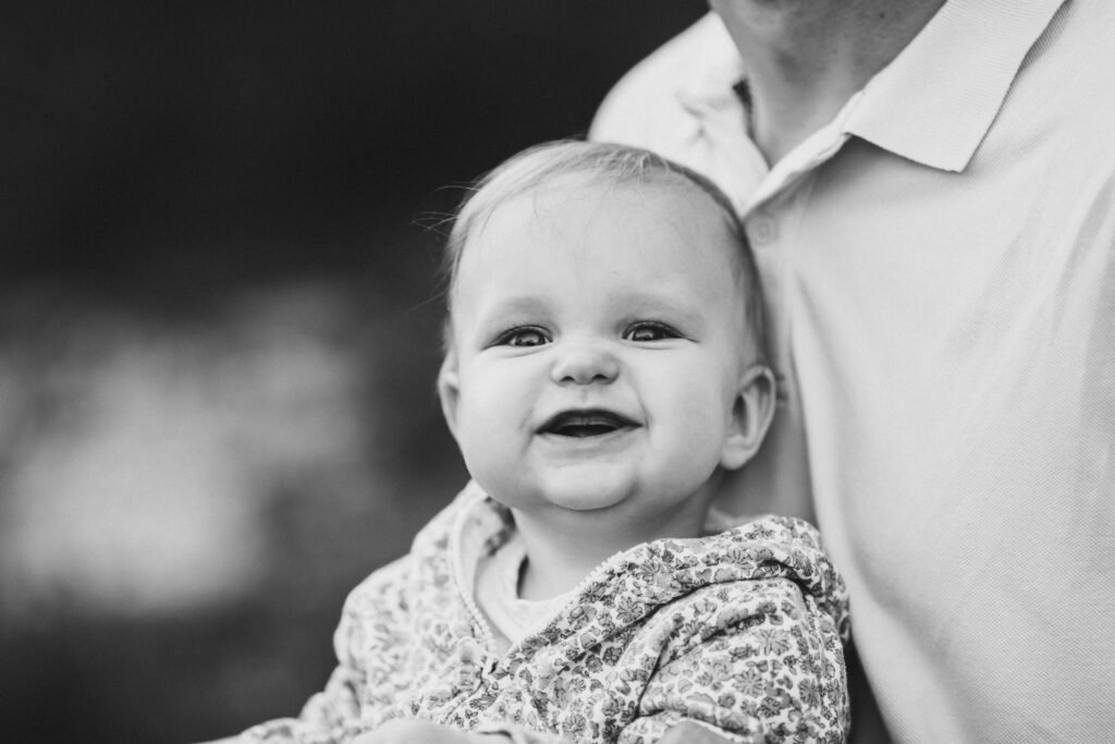Smiling baby during a calm and happy wake time. white noise for babies.