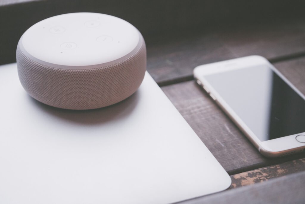 White noise for babies machine beside a smartphone for baby sleep, white noise for babies